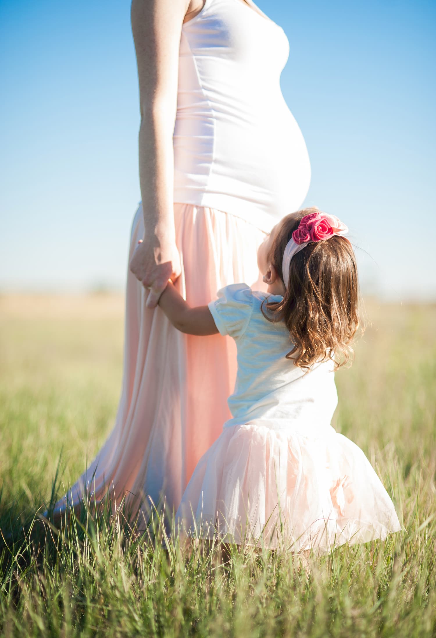 fotografía madre embarazada con su hija