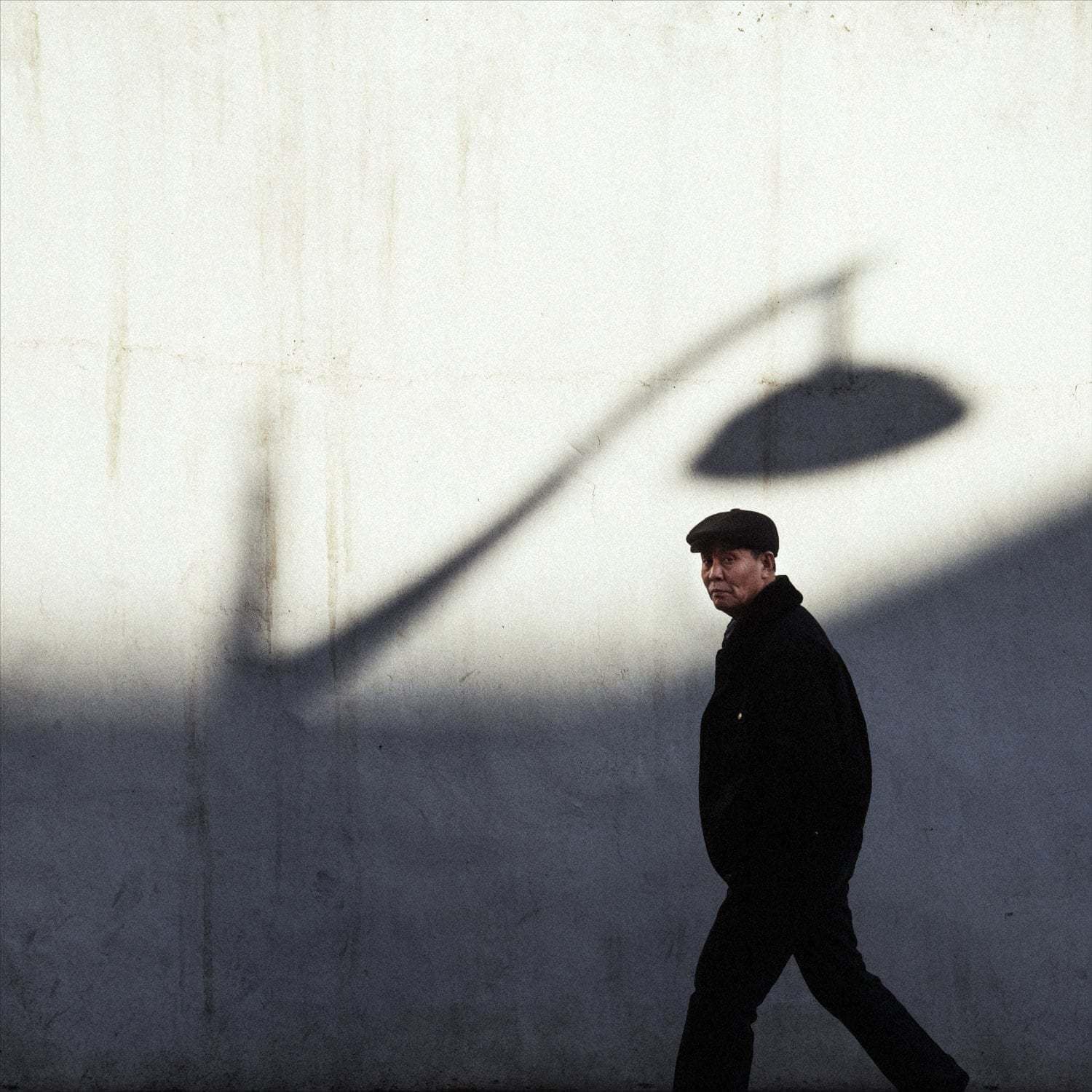 street photography asian man walking