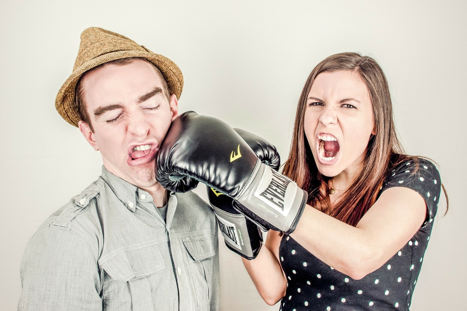 photograph of a couple boxing