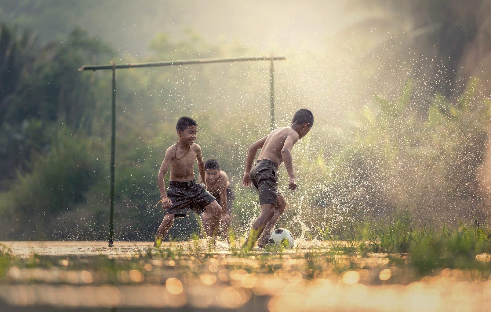 fotografía niños jugando fútbol