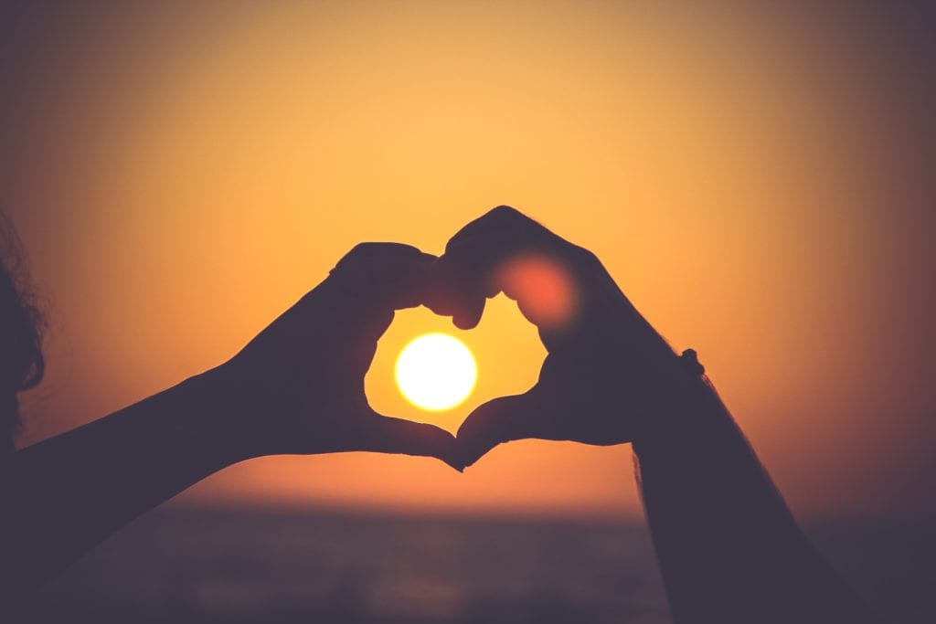 amor sol corazón