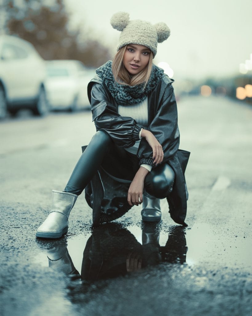 girl posing with wool cap