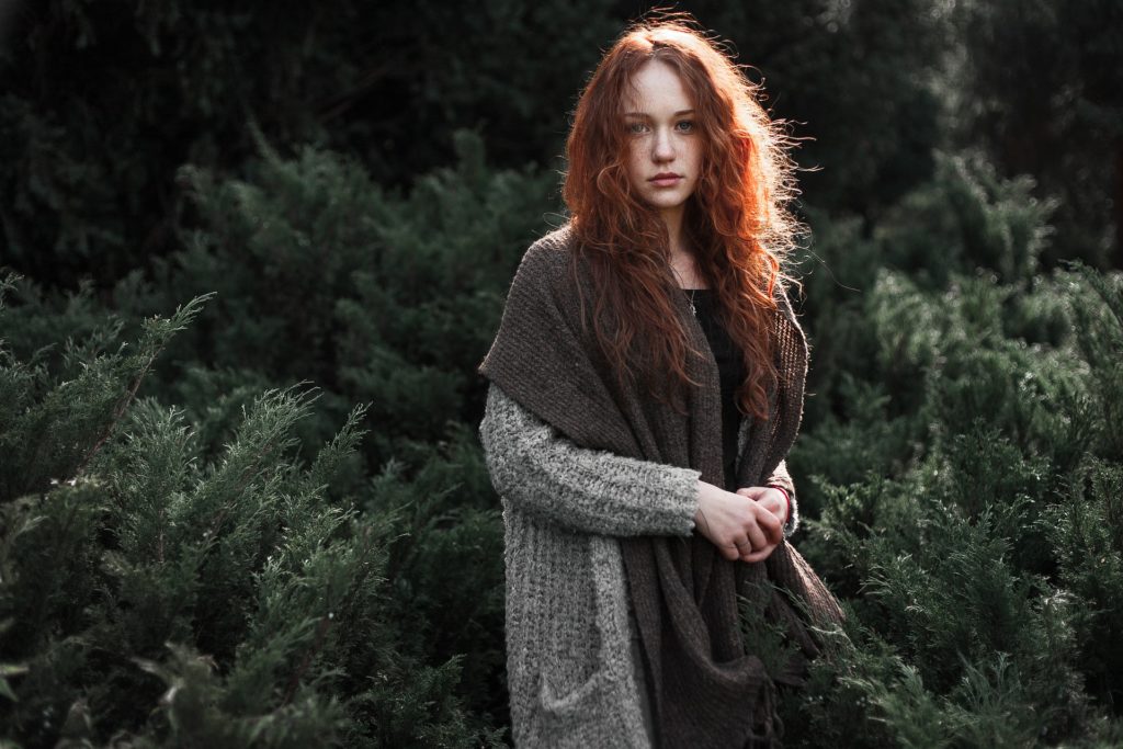 Redhead young woman in natural posed