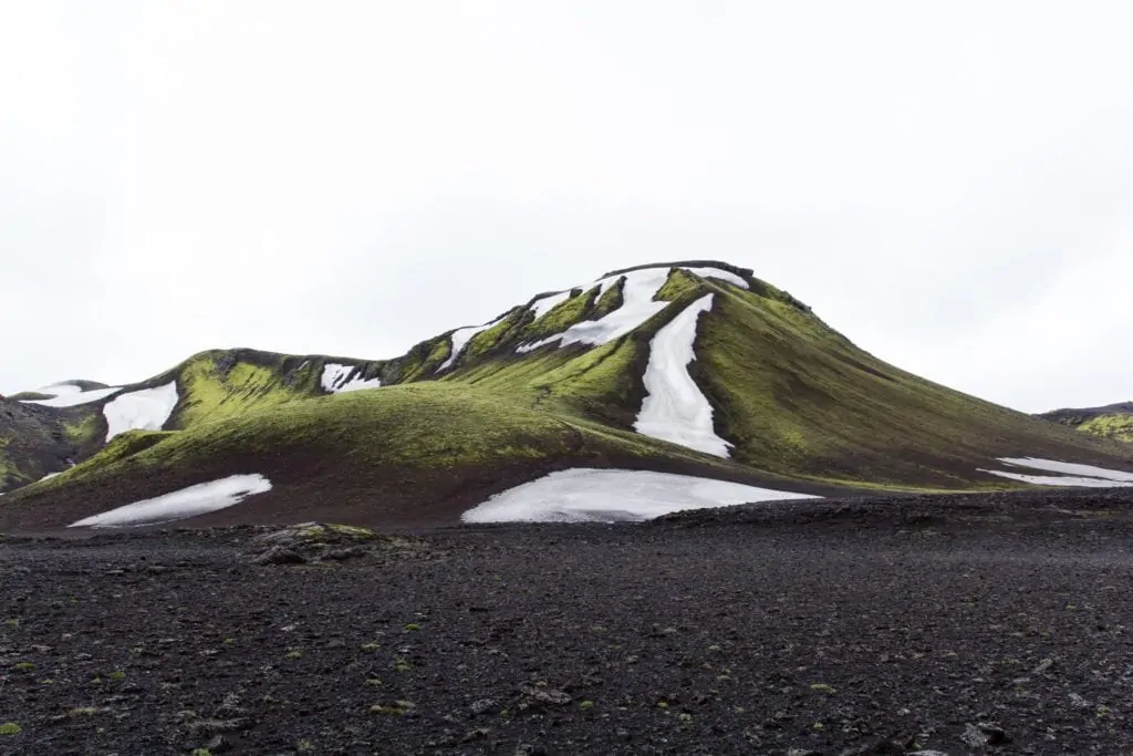 Iceland mountain with ice and green