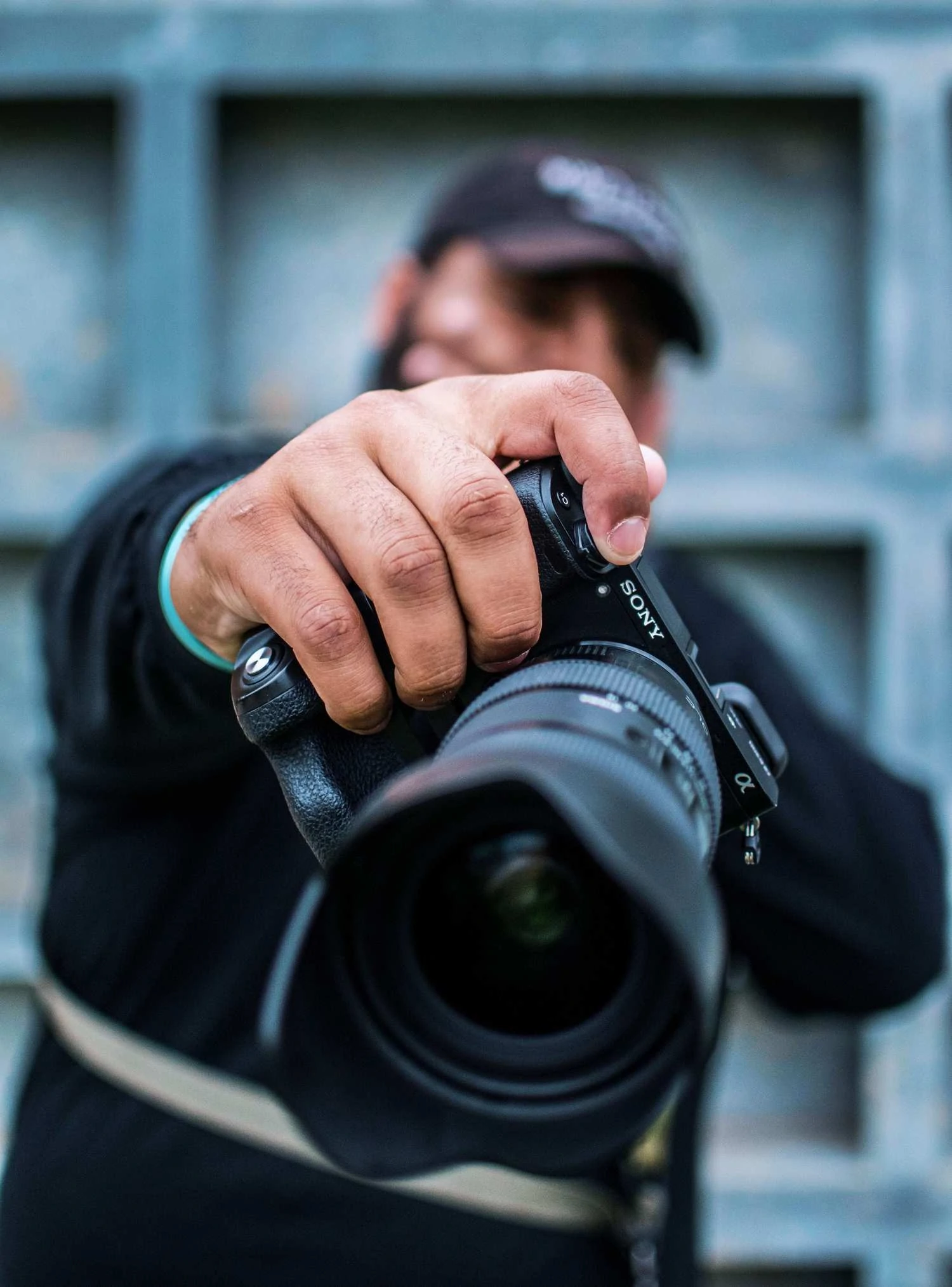 Urban photographer with camera in hand