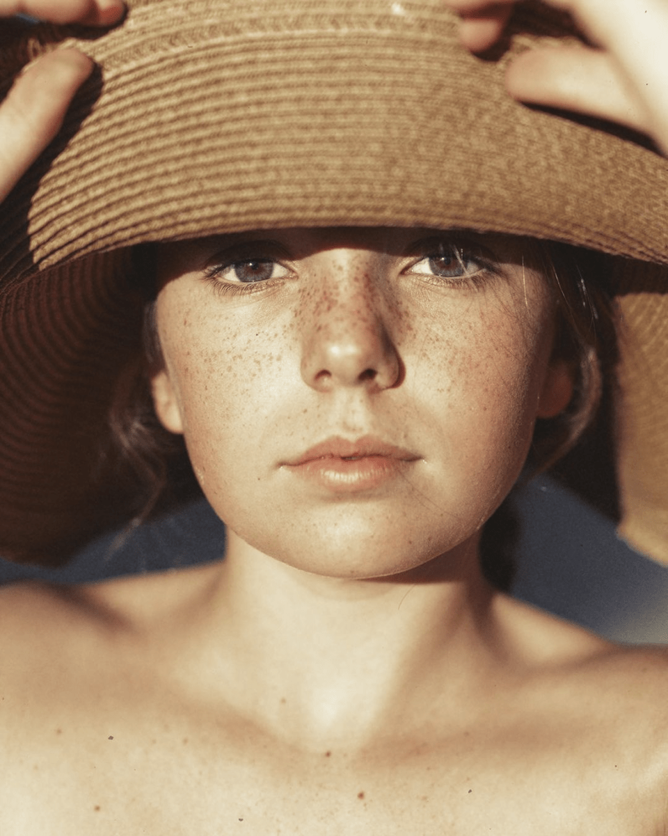 Portrait of boy with hat and freckles