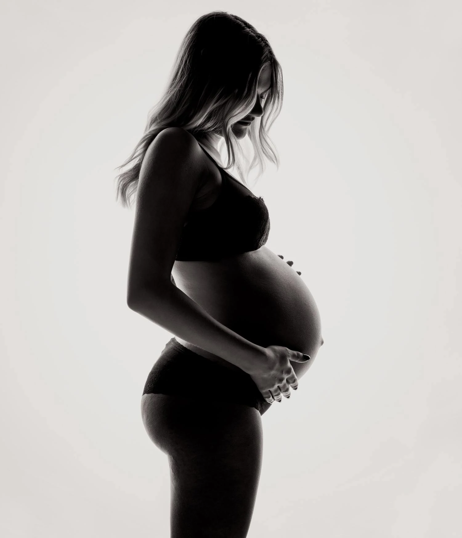 pregnant woman profile black and white