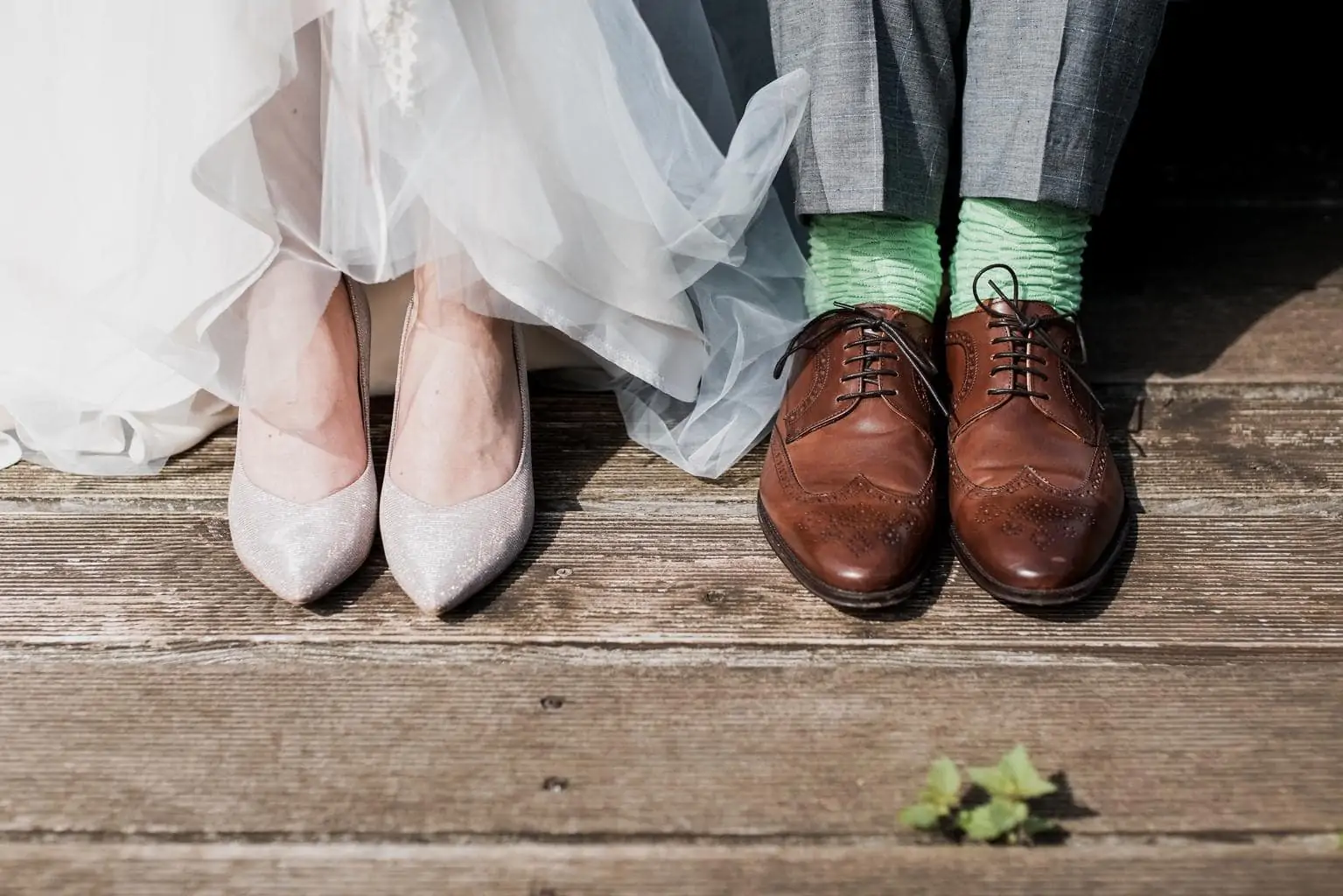 Feet of the bride and groom on the wedding day