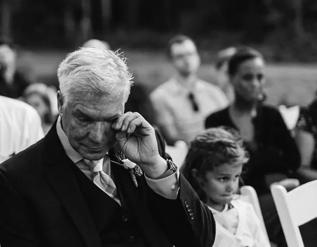 Excited wedding guest photographed by Jess Hunter