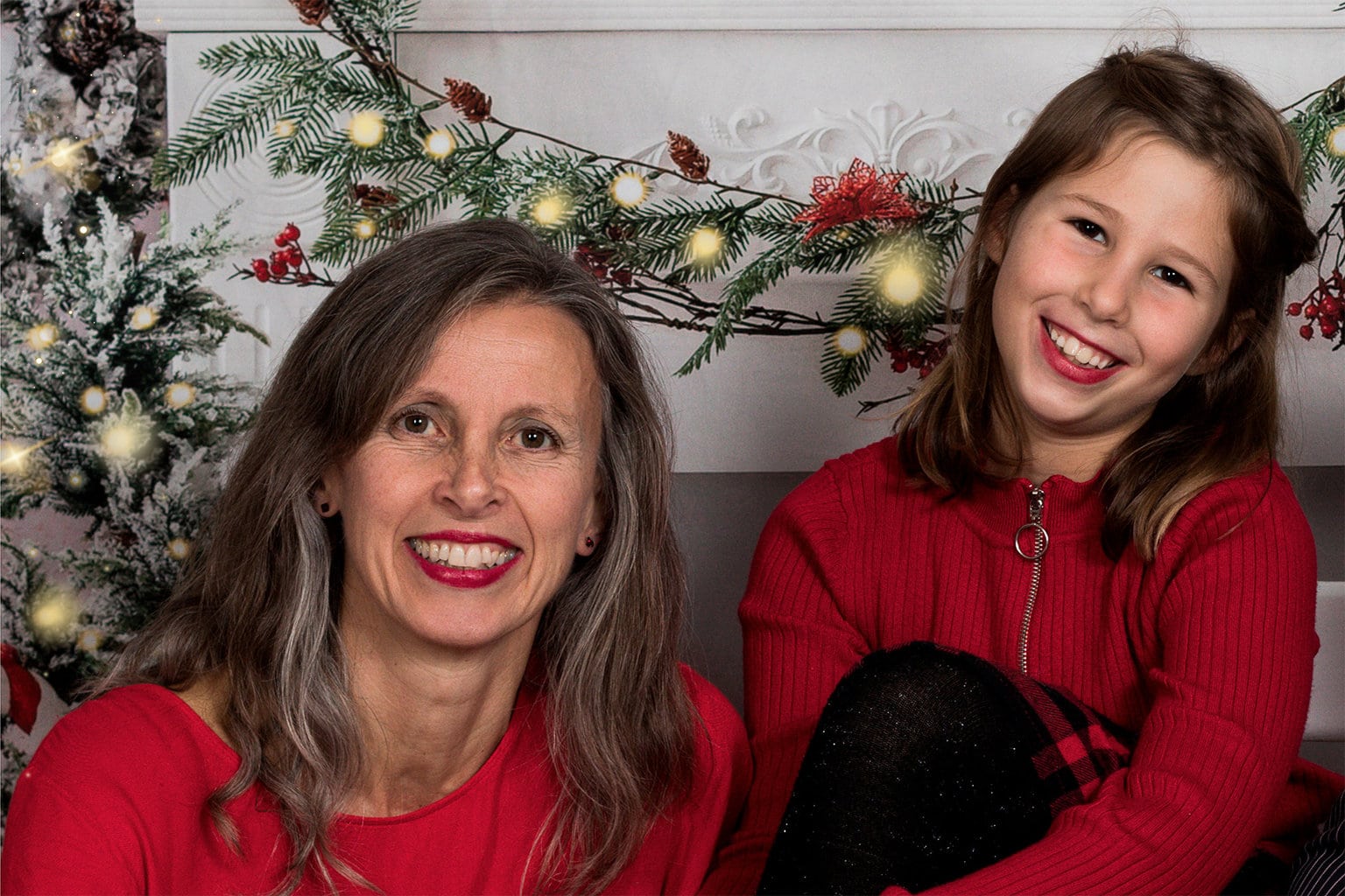 Mother and daughter with Christmas background